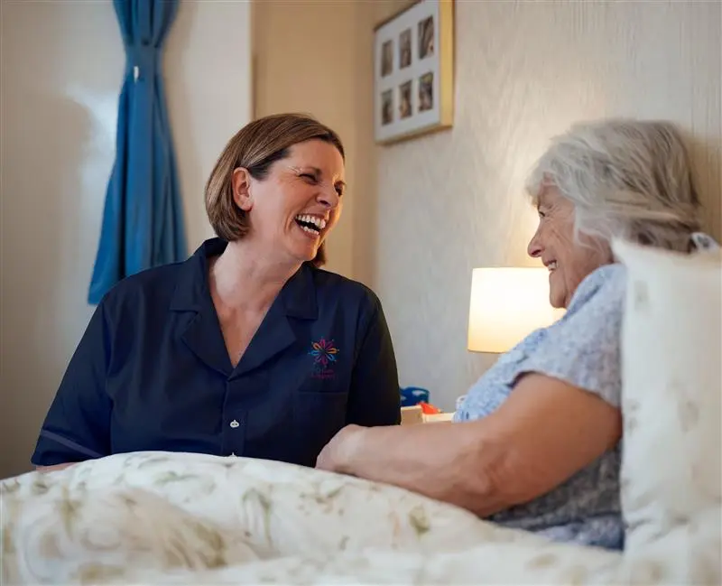 A carer with an elderly lady